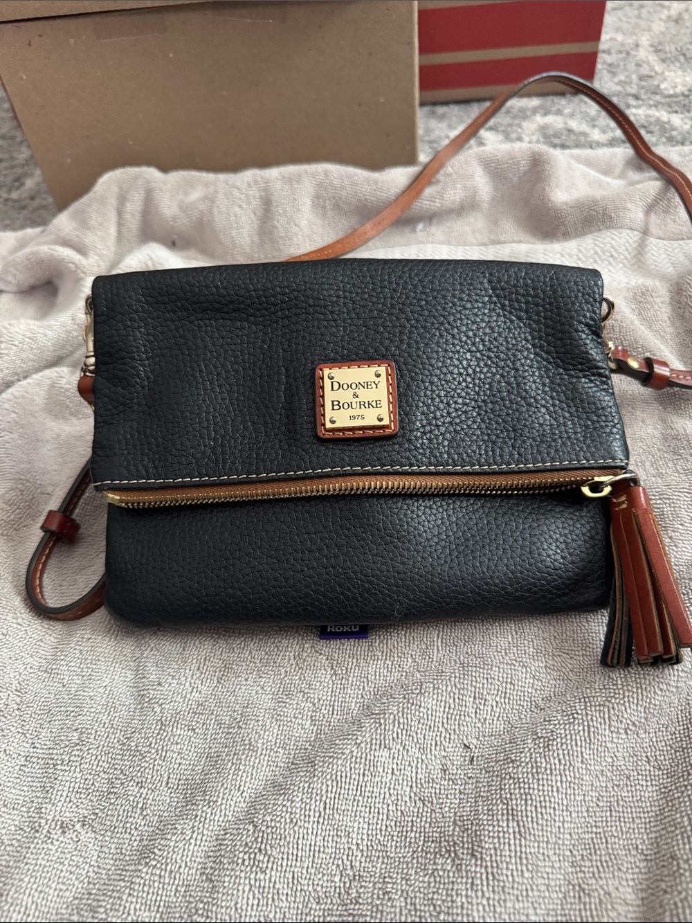 Dooney & Bourke Black Pebbled Leather Crossbody with Brown Trim & Tassel